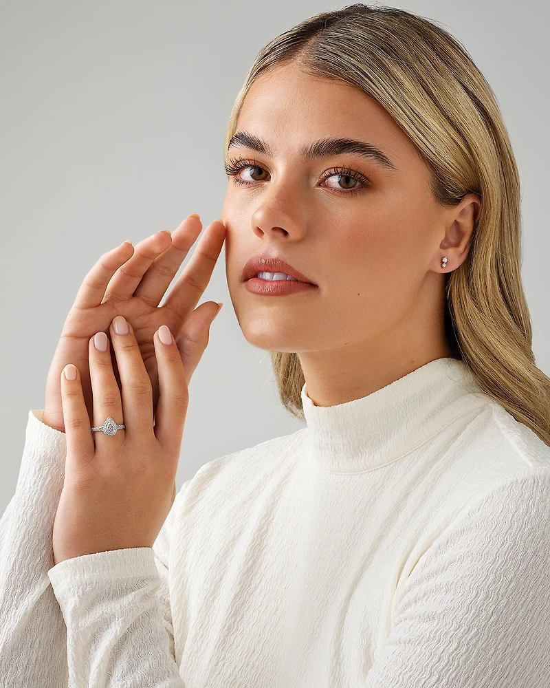 0.30 Carat TW Pear Shaped Cluster Halo Diamond Ring in 10kt White Gold