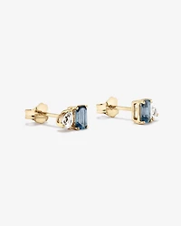 Boucles d’oreilles avec saphir blanc taille poire et topaze bleu de Londres taille émeraude en or jaune 10 carats