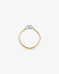 0.15 Carat TW Three Stone Round Brilliant and Oval Cut Diamond Promise Ring in 10kt Yellow and White Gold