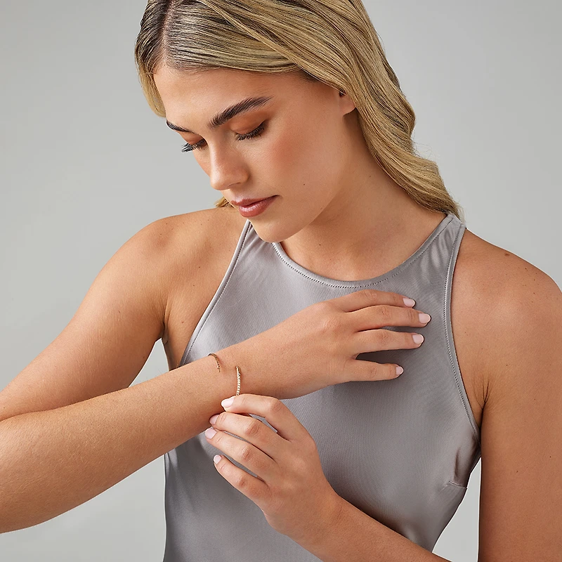 0.68 Carat TW Diamond Row Flex Bangle in 10kt Rose Gold