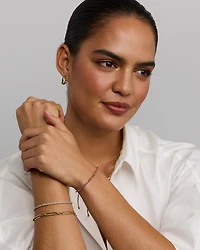 Bracelet de perles en cordon rose poussiéreux en or jaune 10 carats