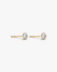 0.25 Carat TW Round Brilliant Diamond Solitaire Bezel Set Stud Earrings in 18kt Yellow Gold