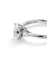 1.10 Carat TW Oval & Pear Cut Three Stone Engagement Ring in 18kt White Gold