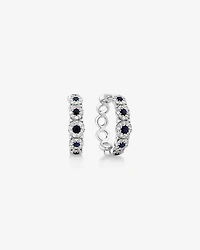 Anneaux courts à bulles en or blanc 14 K avec saphir et diamants totalisant 0,52 ct