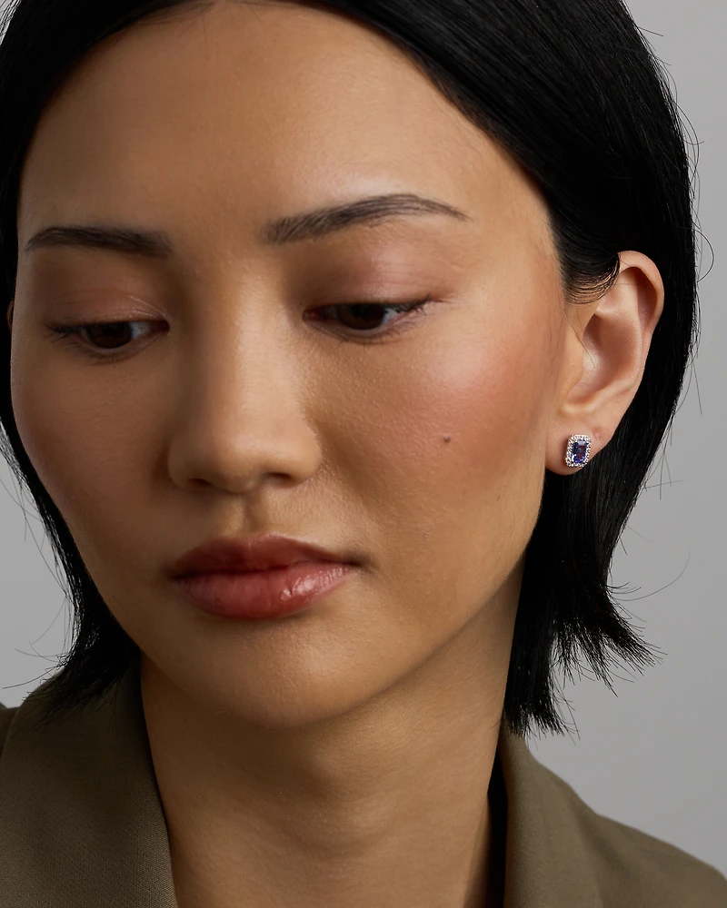 Emerald Cut Blue Tanzanite Gemstone and 0.25Carat TW Diamond Halo Stud Earrings in 14kt White Gold