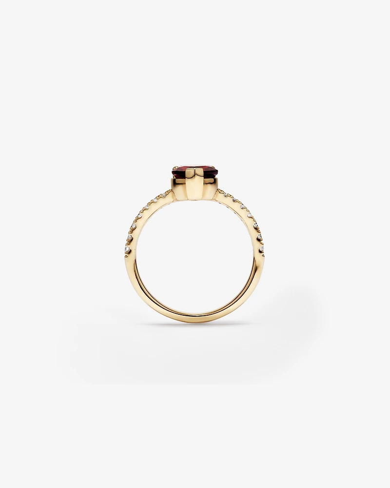 Pear-Cut Garnet Chevron Ring and 0.25 Carat TW of Round Diamonds in 10kt Yellow Gold