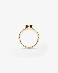 Pear-Cut Garnet Chevron Ring and 0.25 Carat TW of Round Diamonds in 10kt Yellow Gold