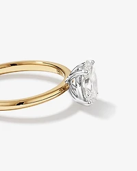 Bague solitaire en diamant canadien ovale 1,00 carat poids total en or jaune et blanc 18 kt