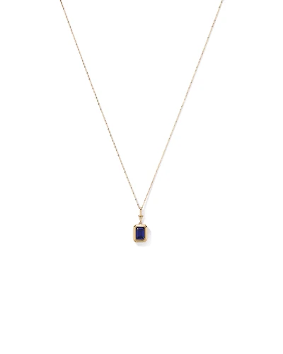 Emerald Cut Created Sapphire Bezel Pendant with Chain in 10kt Yellow Gold