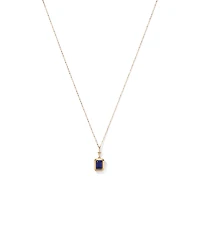 Emerald Cut Created Sapphire Bezel Pendant with Chain in 10kt Yellow Gold
