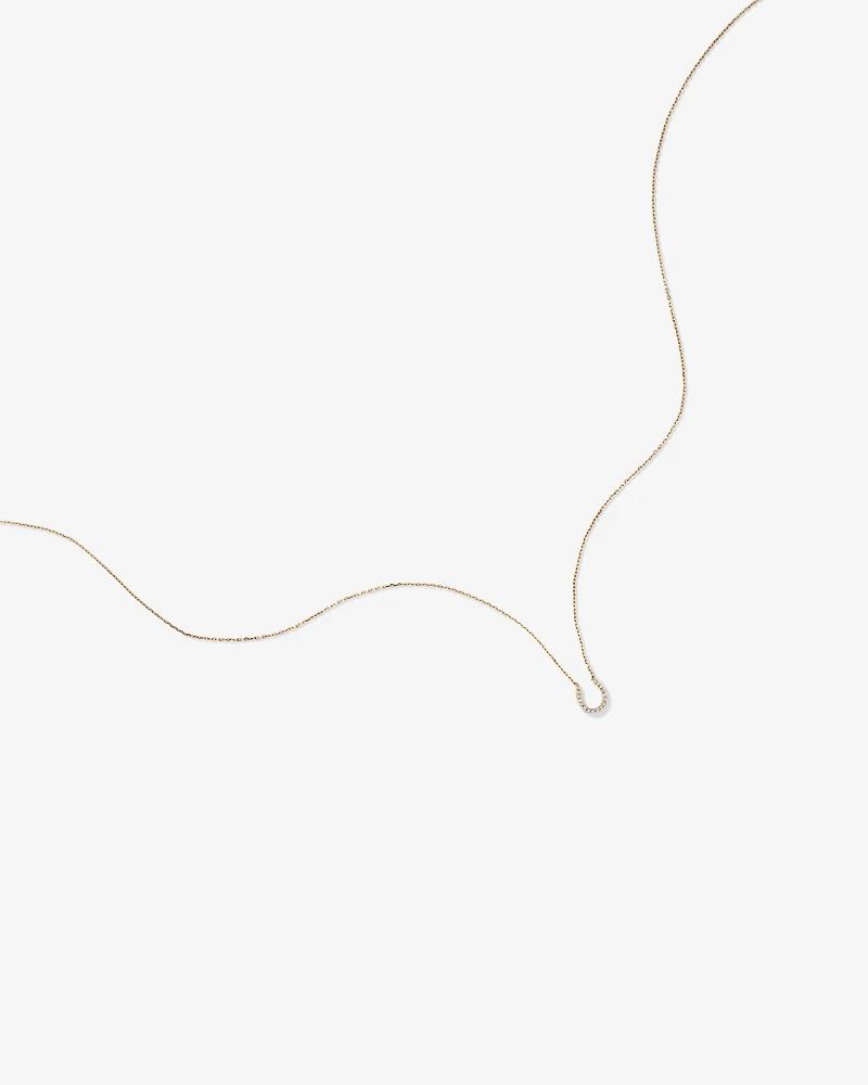 Collier à pendentif fer à cheval en or jaune 10 K avec diamants totalisant 0,10 ct