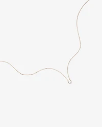 Collier à pendentif fer à cheval en or jaune 10 K avec diamants totalisant 0,10 ct