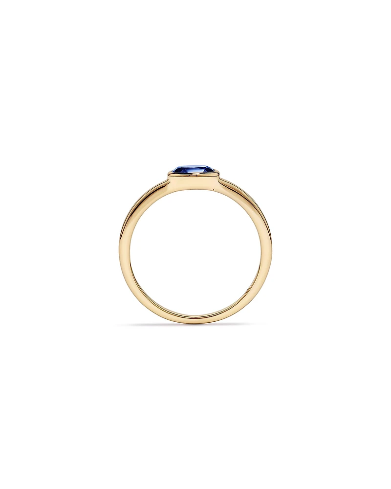 Oval Blue Created Sapphire East-to-West Set Bezel Ring 10kt Gold