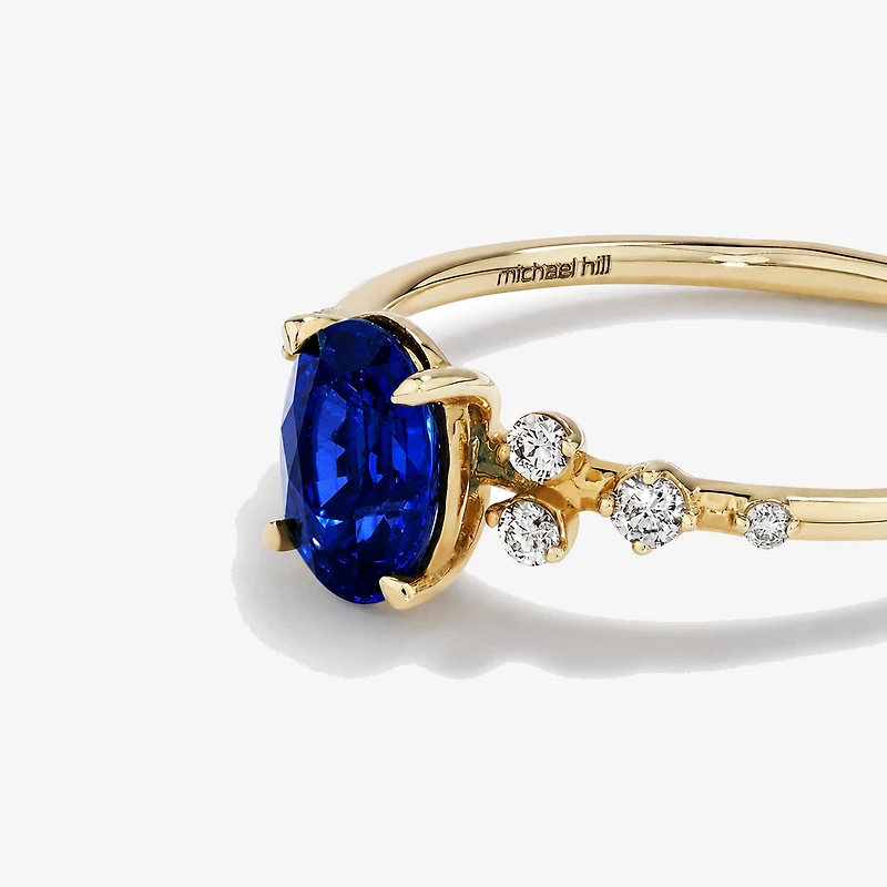 Sapphire and 0.12 Carat TW Diamond Ring 10kt Yellow Gold