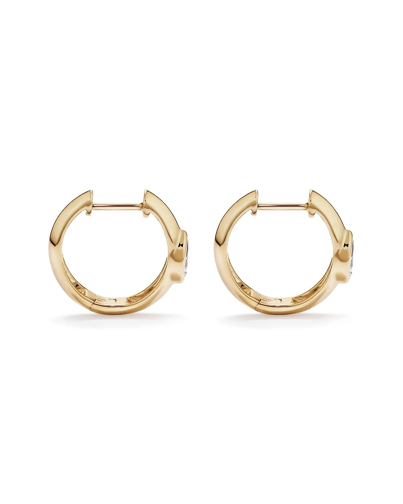 0.50 Carat TW of Laboratory-Grown Pear Cut Diamond Huggie Earrings in 10kt Yellow Gold