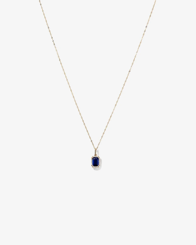 Pendentif halo Saphir créé taille émeraude avec diamants et chaîne en or jaune 10 ct