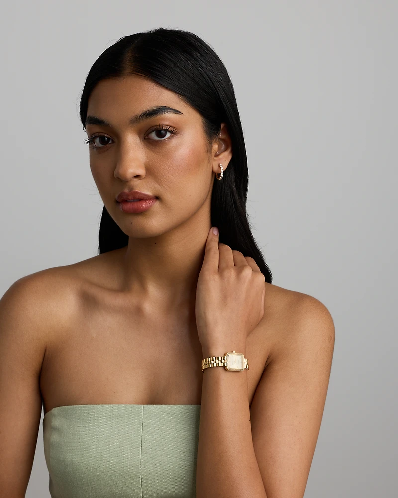 Women's 0.20 Carat TW Diamond Bezel Watch in Gold Tone Stainless Steel