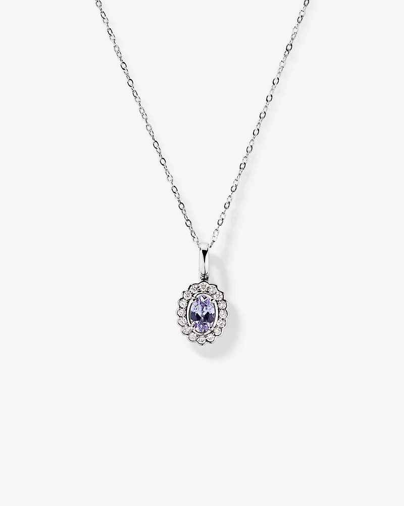 Tanzanite & 0.15TW of Diamond Halo Pendant with Chain in 10kt Gold