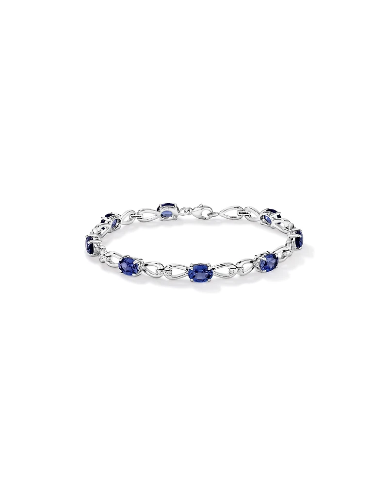 Oval Cut Blue Created Sapphire Gemstone and Diamond Bracelet in Sterling Silver