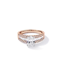 Bague en or rose et blanc 14 carats, sertie de diamants ovales baguettes synthèse d'un poids total 2,21 carats