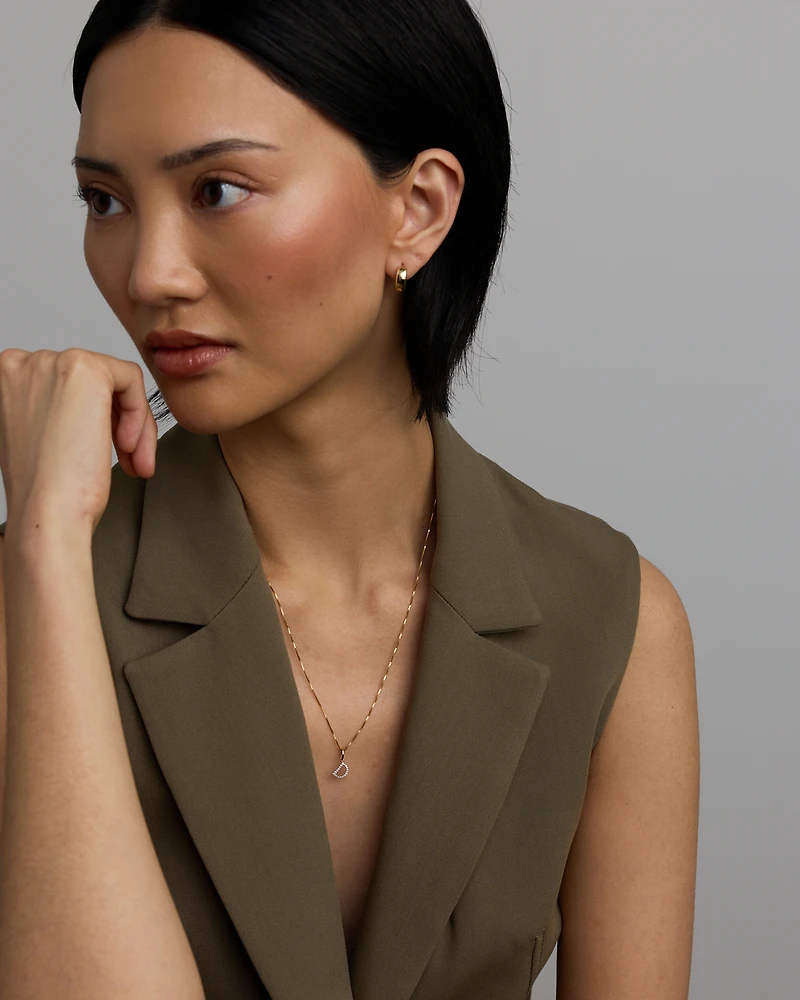 Pendentif initiale lettre D en diamant en or jaune 10 carats