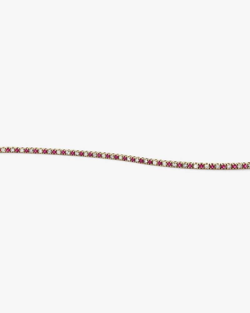 0.68 Carat TW Diamond and Created Ruby Tennis Bracelet in 10kt Yellow Gold