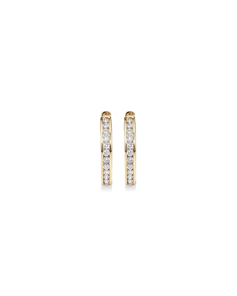 0.25 Carat TW Channel Set Round Brilliant Diamond Huggie Hoop Earrings in 10kt Yellow Gold