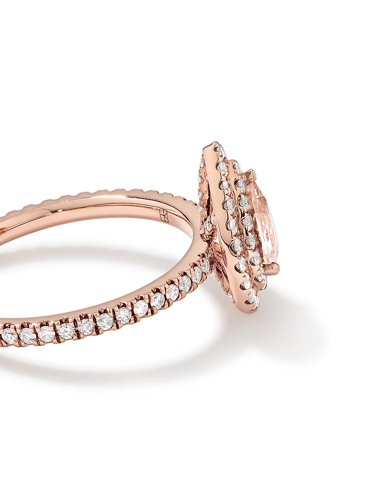 Pear Cut Morganite Gemstone and 0.45 Carat TW Diamond Halo and Side Accent Engagement Ring in 10kt Rose Gold