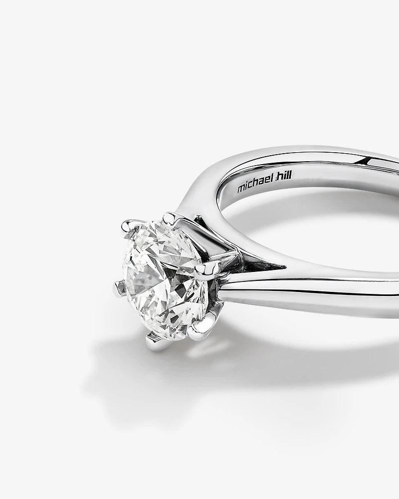 Certified Solitaire Engagement Ring with a Carat TW Diamond in 14kt White Gold