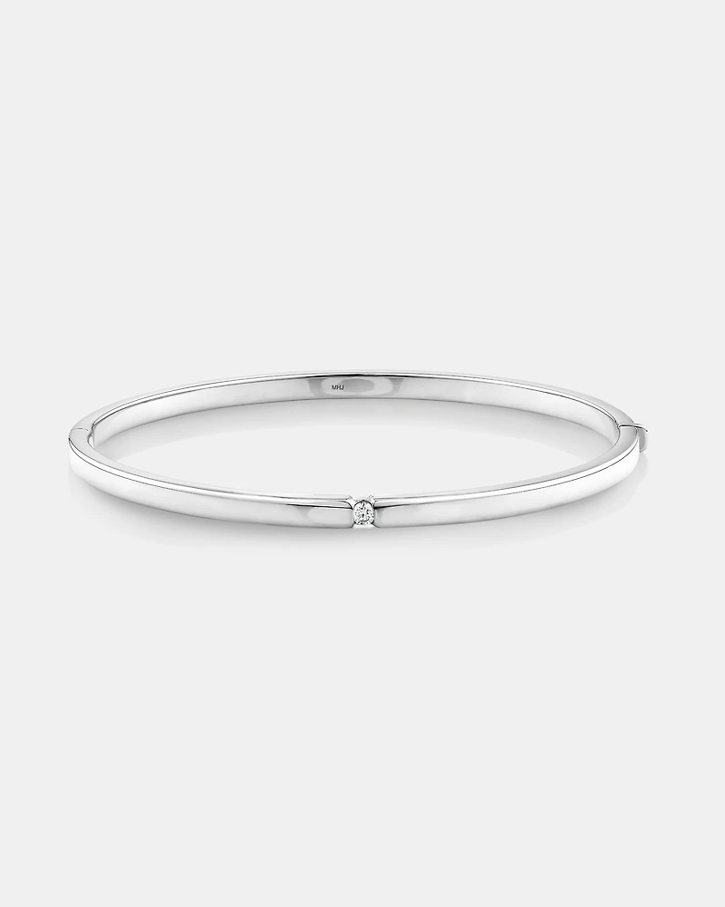 Diamond Accent Oval Bangle in 10kt White Gold