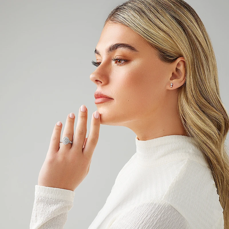 0.65 Carat TW Oval Shaped Cluster Halo Diamond Ring in 10kt White Gold