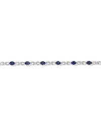 Oval Cut Blue Created Sapphire Gemstone and Diamond Bracelet in Sterling Silver