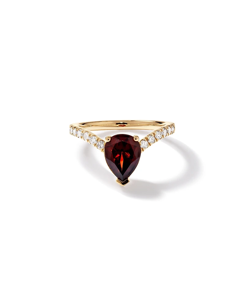 Pear-Cut Garnet Chevron Ring and 0.25 Carat TW of Round Diamonds in 10kt Yellow Gold