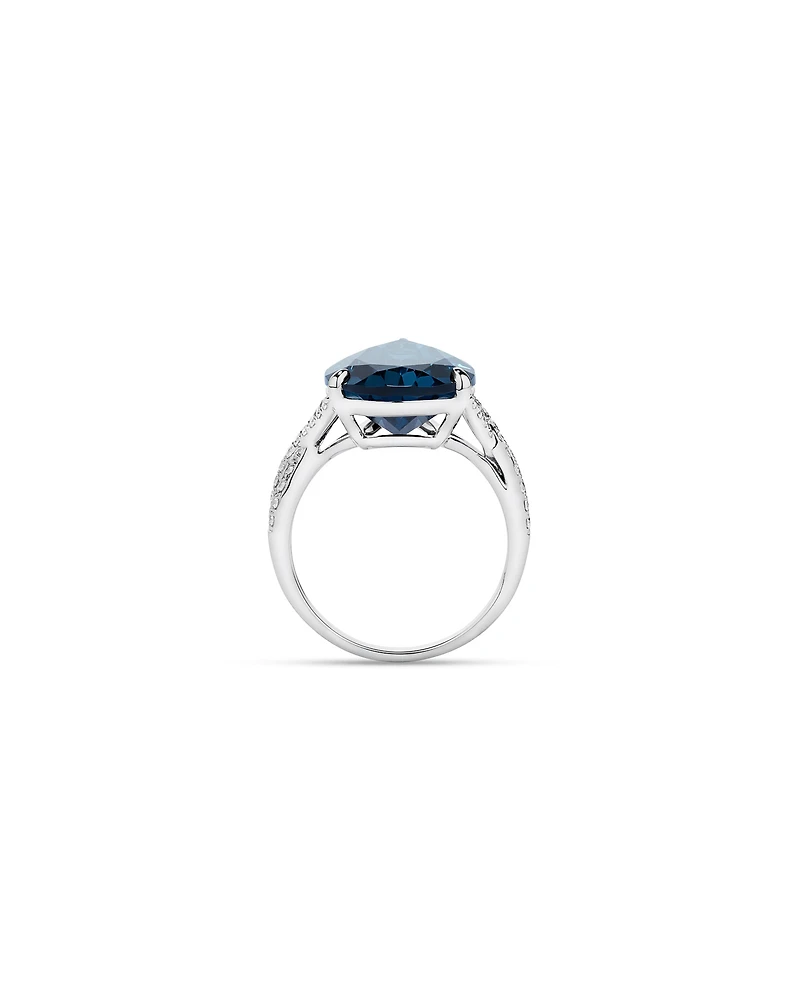 Pear Cut London Blue Topaz & 0.28 Carat TW Diamond Twist Ring 10kt Gold