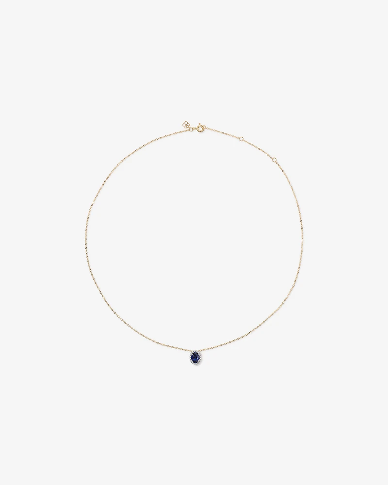 Oval Cut Blue Created Sapphire and Lab-Grown Diamond Halo Stud Earrings and Pendant Necklace Set in 10kt Yellow Gold and Rhodium