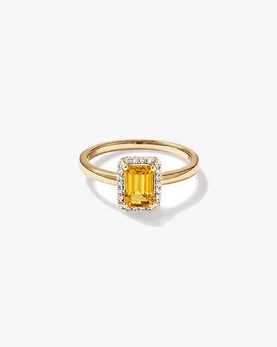 Bague en or jaune 10 carats avec citrine taille émeraude et halo de diamants