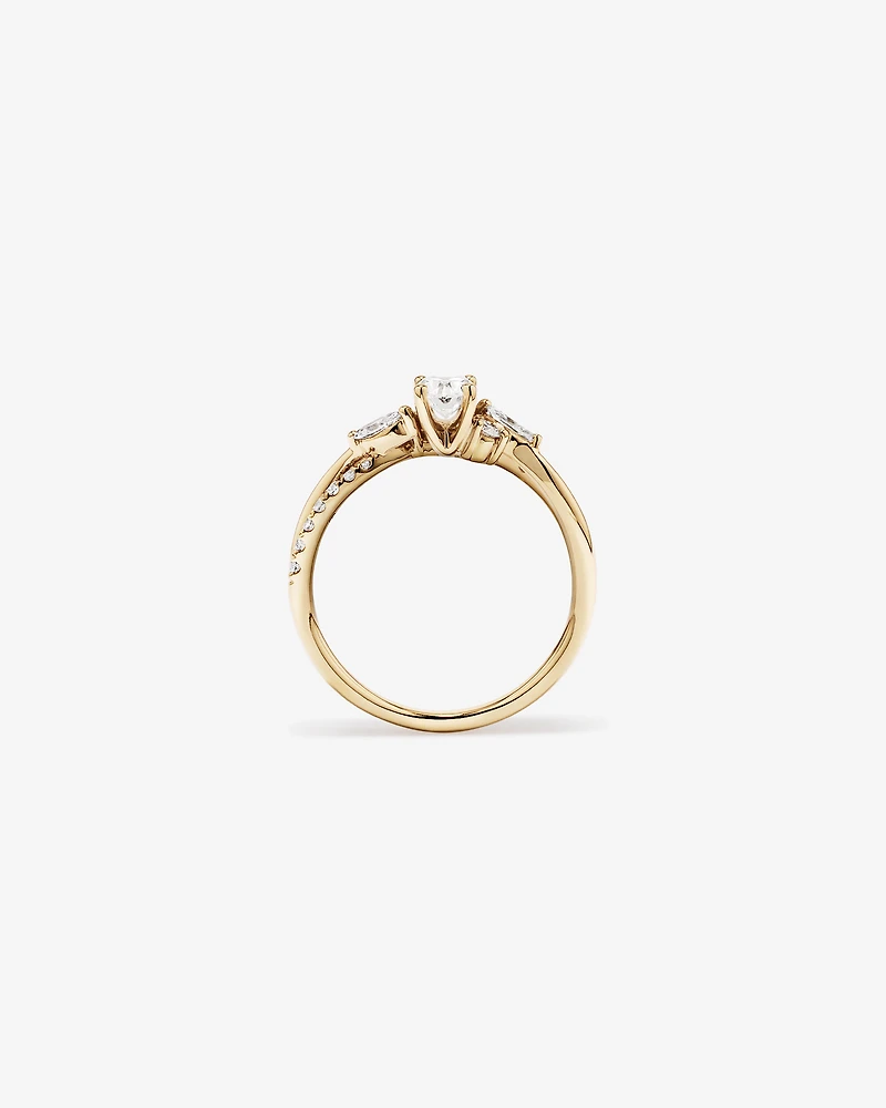 0,83 carat TW bague de fiançailles torsadée avec diamants ovales et marquise en or jaune 14 carats