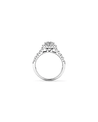 Bague en or blanc 14 carats sertie de diamants ronds brillants et baguettes (1,25 carat au total)