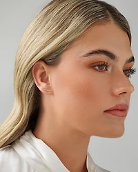 Boucles d'oreilles grimpeuses avec 0,25 carat TW de diamants en or jaune 10 kt