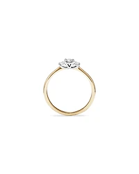 0.15 Carat TW Three Stone Round Brilliant and Oval Cut Diamond Promise Ring in 10kt Yellow and White Gold