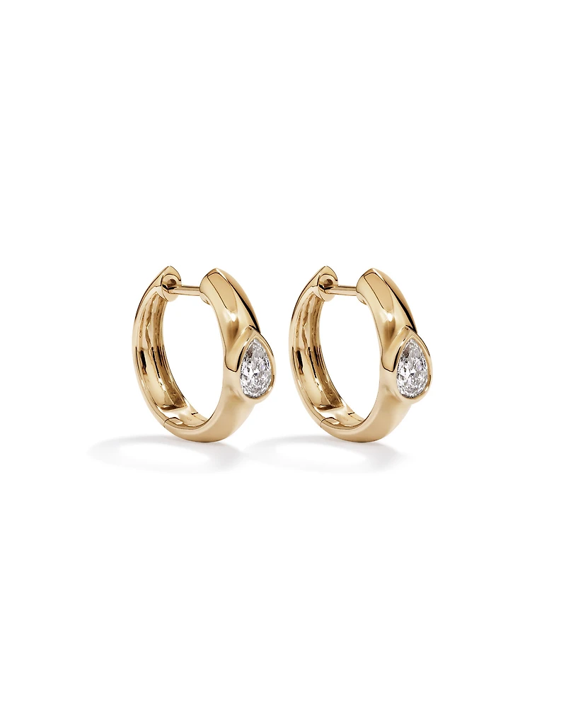 0.50 Carat TW of Laboratory-Grown Pear Cut Diamond Huggie Earrings in 10kt Yellow Gold