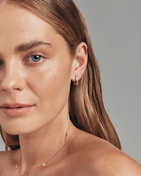 Anneaux courts en or rose 10 K à diamants totalisant 0,25 ct