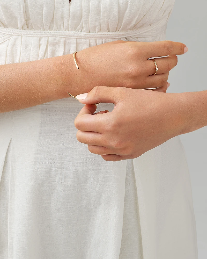 0.68 Carat TW Diamond Row Flex Bangle in 10kt Yellow Gold