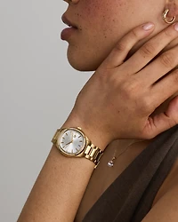Ladies 0.40 Carat TW Diamond Quartz Watch in Yellow Gold Tone Stainless Steel