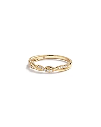 0.11 Carat TW Diamond Twist Wedding Ring in 14kt Yellow Gold