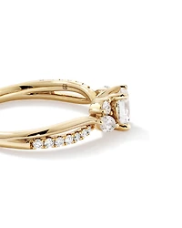 0.83 Carat TW Oval and Marquise Twist Engagement Ring in 14kt Yellow Gold