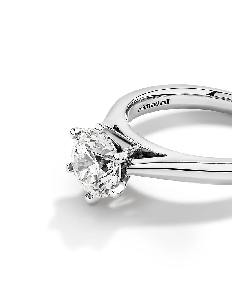 Certified Solitaire Engagement Ring with a Carat TW Diamond in 14kt White Gold