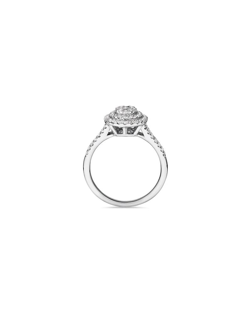 0.65 Carat TW Oval Shaped Cluster Halo Diamond Ring in 10kt White Gold