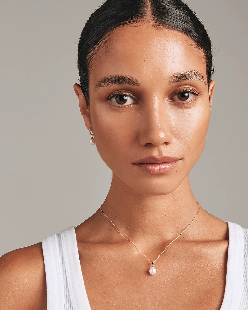 Pendentif en or jaune 10 K avec perle d'eau douce de culture