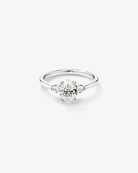 1.10 Carat TW Oval & Pear Cut Three Stone Engagement Ring in 18kt White Gold